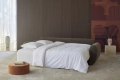Sofa rozkładana Norum z zaokrąglonymi podłokietnikami Innovation Living różne warianty