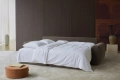 Sofa rozkładana Norum z podłokietnikami Innovation Living różne warianty
